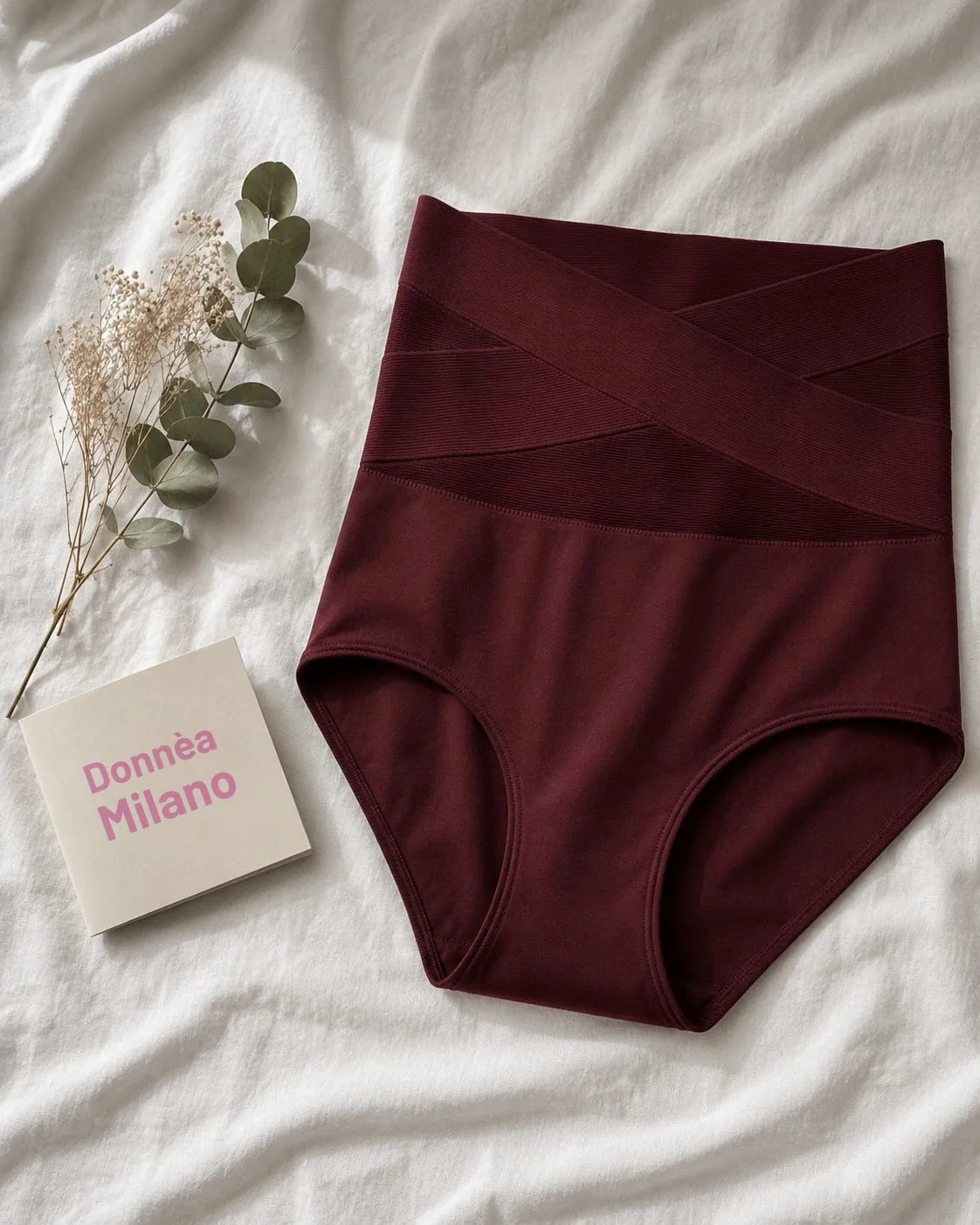 Culotte gainante Donnèa Milano posée sur un drap